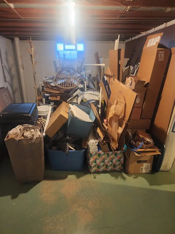 Roll-off dumpster container at job site for Yard Waste Dumpster Rental in Pipestone